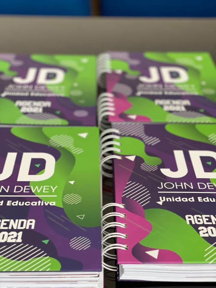 Agendas John Dewey anilladas impresas en taller